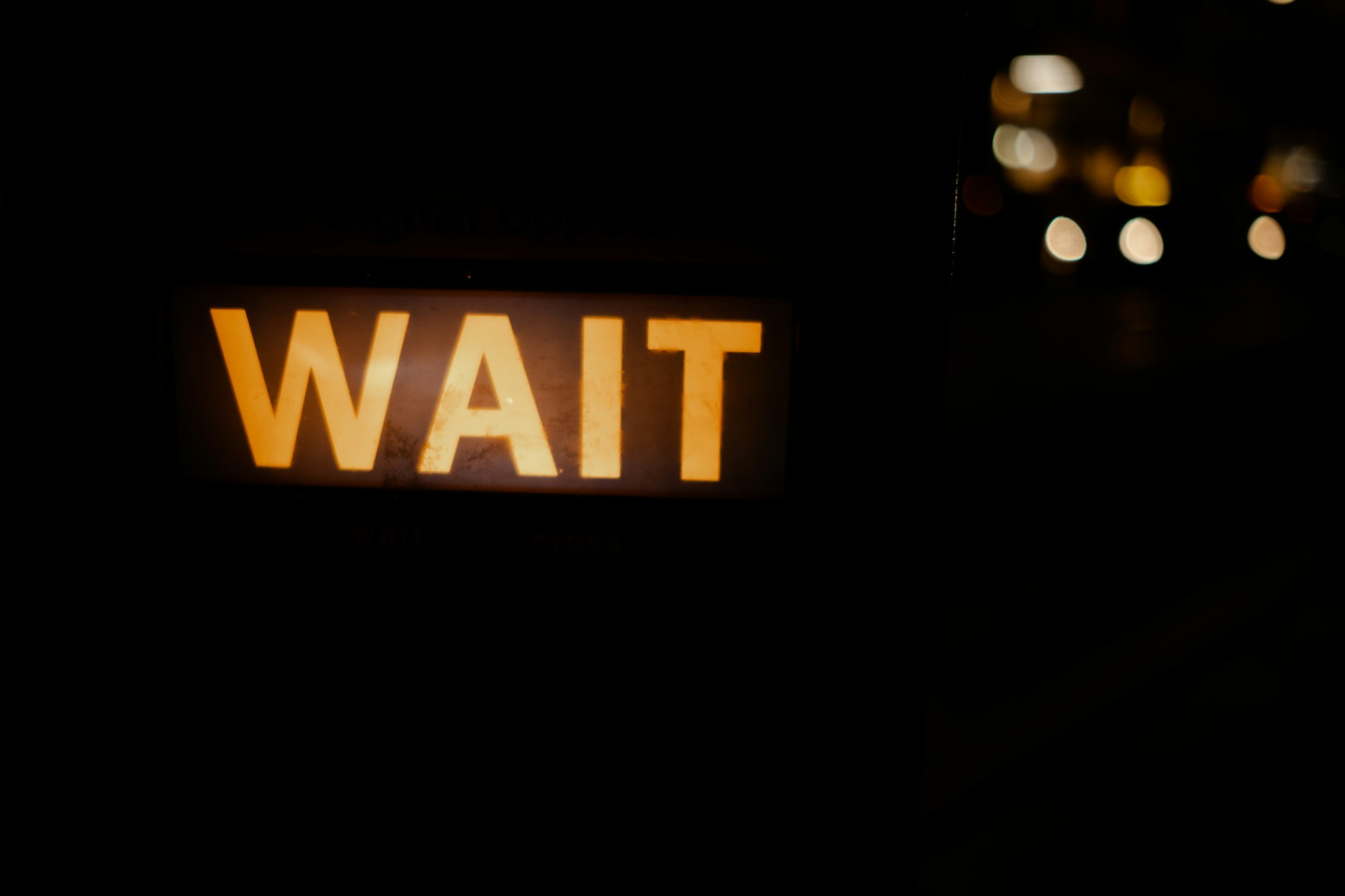 London road sign - wait, taxi on the background